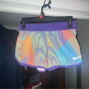 Nike Women's Vibrant Athletic Shorts with Purple Waistband